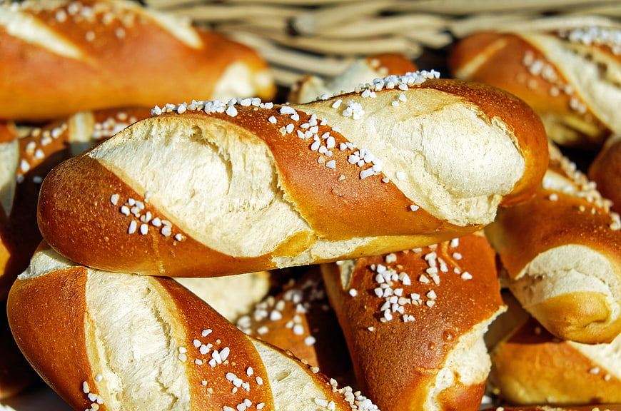 Freshly baked pretzels with coarse salt in a basket