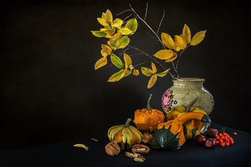 Autumn Still Life with Gourds, Nuts, and Yellow Leaves in Ceramic Vase