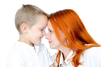 Mother And Son Forehead Touch On White Background