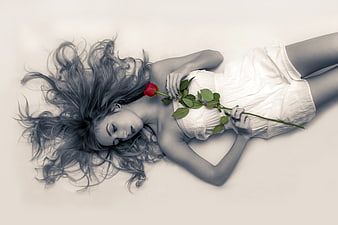 Woman with Red Rose on White Background