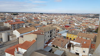 Aerial View of Tarazona Town with Red Roofs and Silos