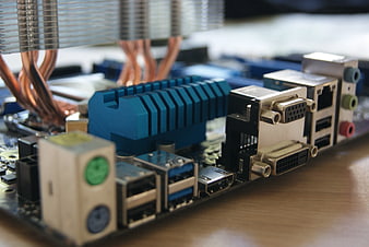Close-up of computer motherboard ports and heatsink