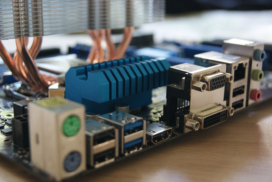 Close-up of computer motherboard ports and heatsink