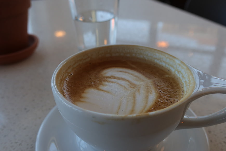 Close-up of Latte Art in White Coffee Cup