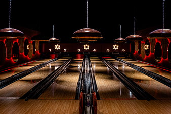 Empty Vintage Bowling Alley with Retro Lanes and Neon Lights