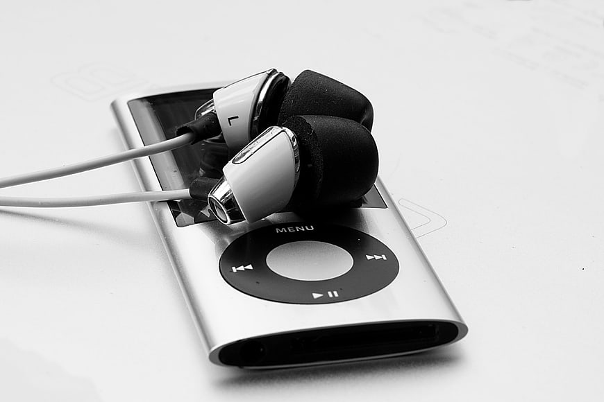 Black and White Close-Up of iPod Nano with Earbuds