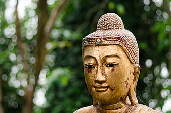 Close-up of Golden Buddha Statue in Thai Temple