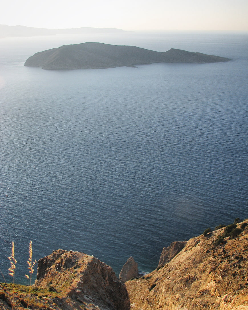 Scenic View of a Rocky Island in the Calm Blue Sea