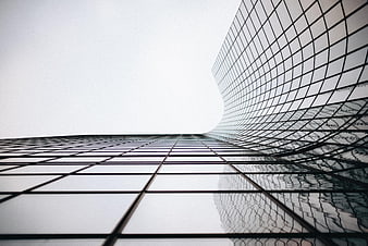 Low angle view of modern glass skyscraper architecture