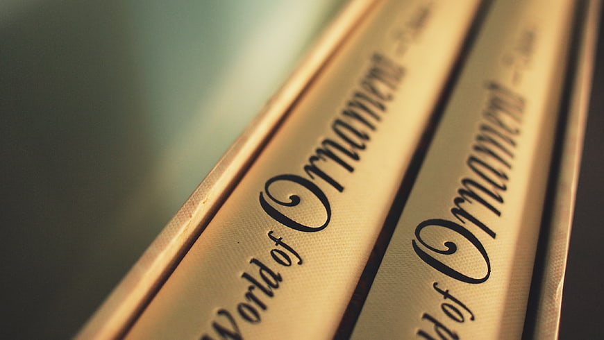 Close-up of vintage book spines with elegant typography