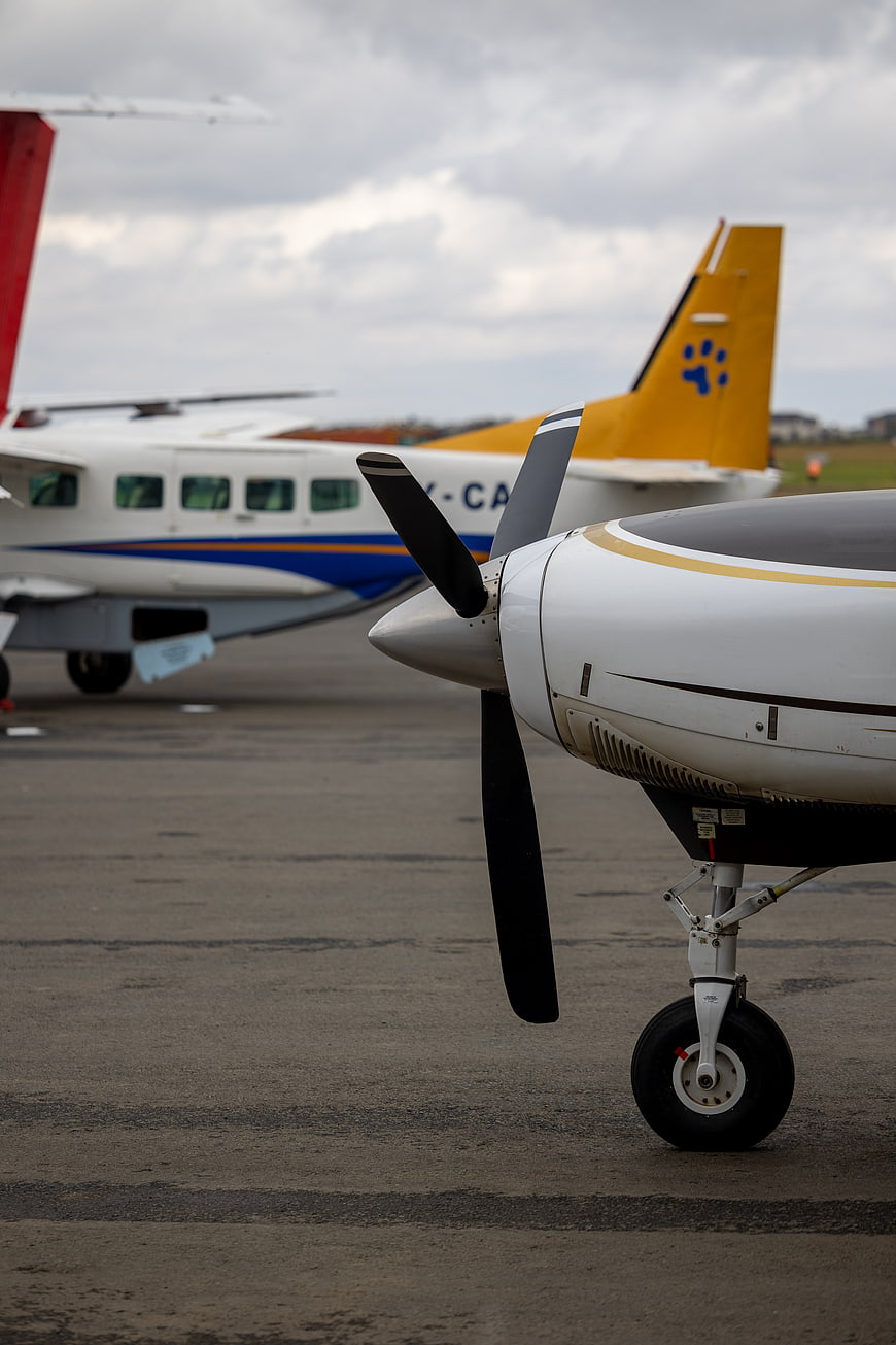 Close-up of small propeller airplane on airport tarmac