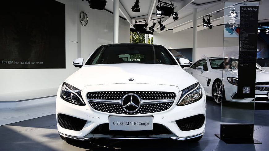 White Mercedes-Benz C 200 4MATIC Coupe in Showroom
