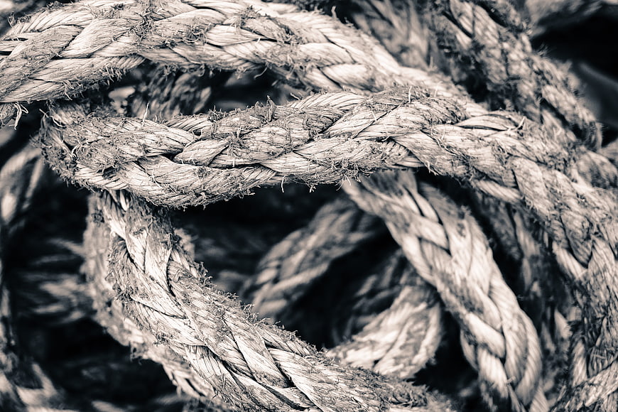 Close-up of weathered twisted rope texture