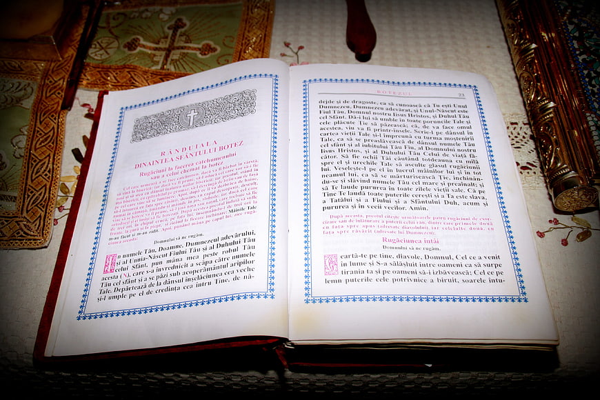 Open Orthodox Prayer Book with Religious Text and Icons