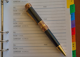Luxury Gold Pen On Address Book Page