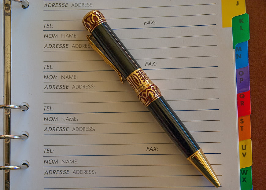 Luxury Gold Pen On Address Book Page