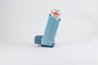 Blue Asthma Inhaler on White Background