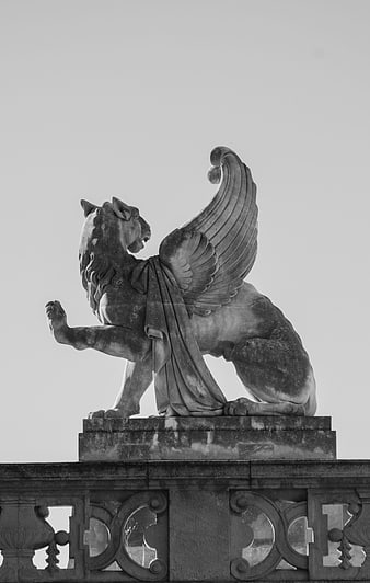 Black and white photo of winged lion statue in Marseille