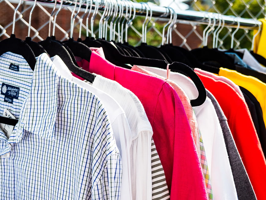 Colorful Shirts Hanging on Outdoor Clothing Rack