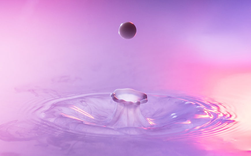 High Speed Photography of Water Drop Splash in Pink and Purple