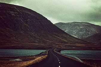 Winding Road Through Dramatic Mountain Landscape