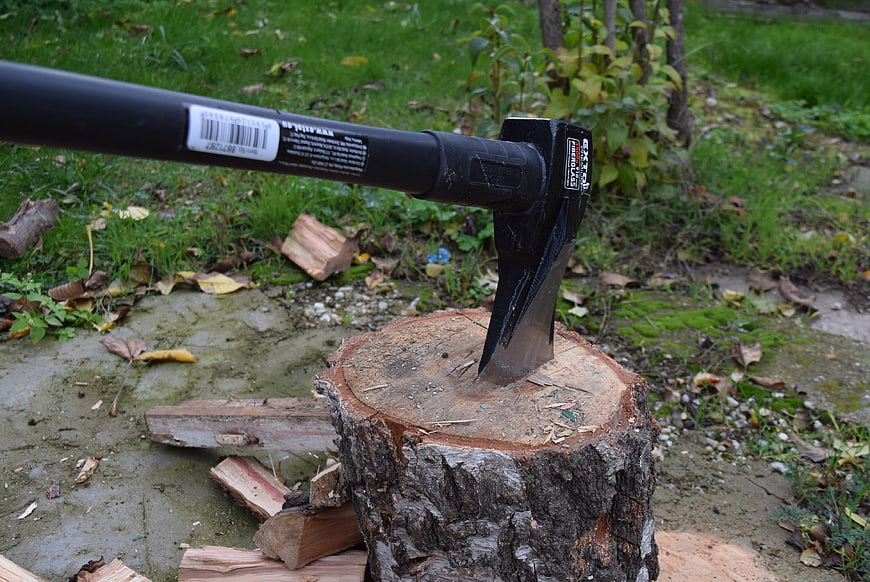 Black Axe Embedded in Tree Stump for Firewood