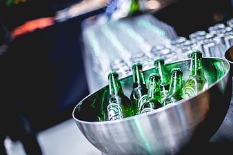 Chilled Heineken Beer Bottles in Silver Ice Bucket