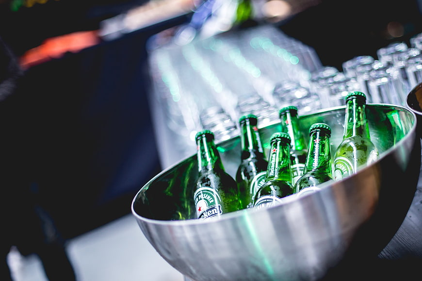 Chilled Heineken Beer Bottles in Silver Ice Bucket
