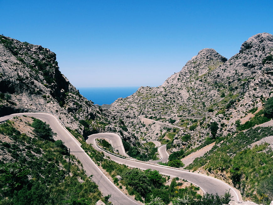 Winding Mountain Road with Ocean View