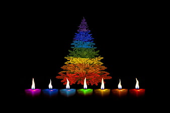 Rainbow Christmas Tree with Colorful Candles on Black Background