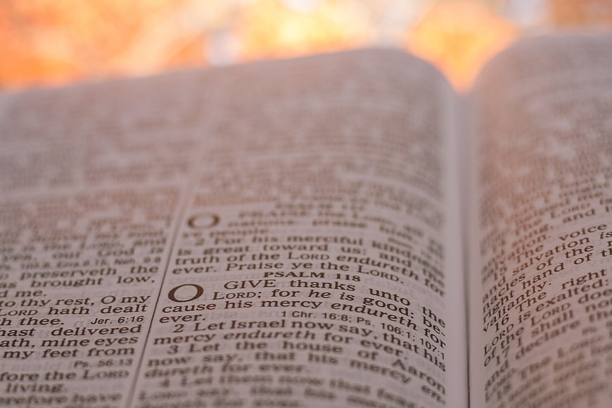 Open Bible Showing Psalm 118 Text With Warm Bokeh Background