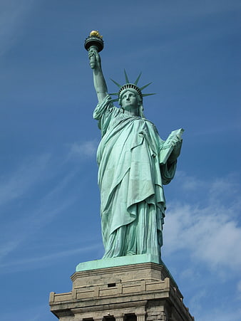Statue of Liberty against blue sky