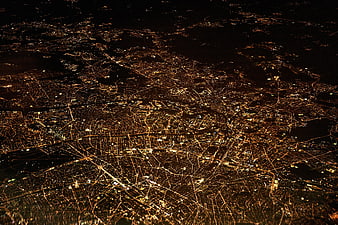 Aerial Night View of City Lights and Urban Grid
