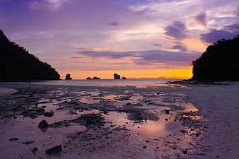 Sunset at Railay Beach Thailand with limestone karsts