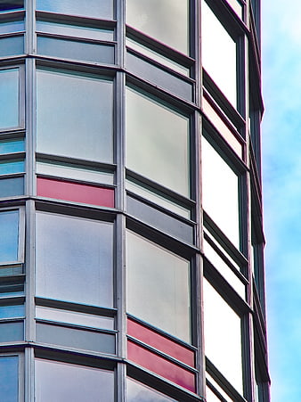 Modern Glass Office Building Facade with Red Accents
