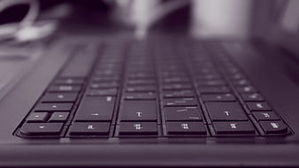 Close-up of laptop keyboard with shallow depth of field