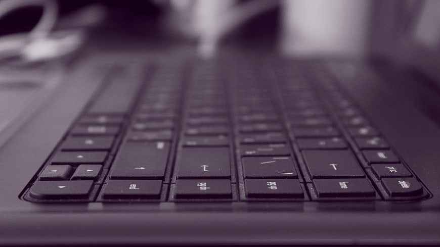Close-up of laptop keyboard with shallow depth of field