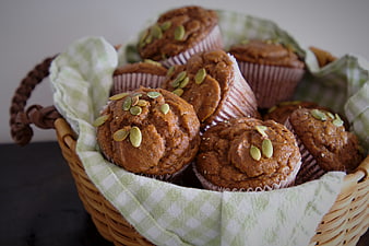 Homemade Pumpkin Muffins in Wicker Basket