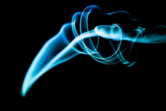 Abstract Blue Smoke Swirls on Black Background
