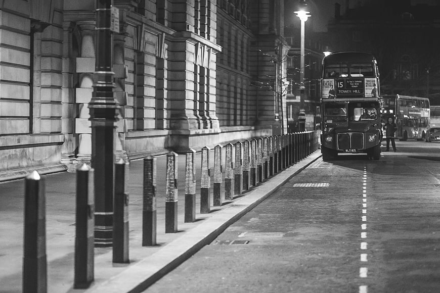 Black and White Night Photo of London Double Decker Bus
