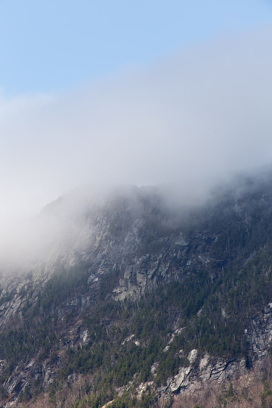 Misty Mountain Ridge with Fog and Forest