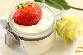 Strawberry Yogurt Dessert in Glass Jar with Yellow Rose