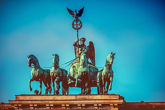 Brandenburg Gate Quadriga Statue Against Blue Sky