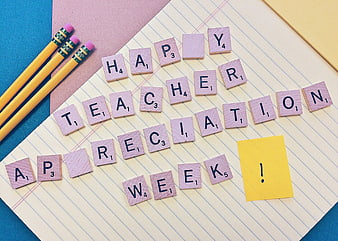Happy Teacher Appreciation Week Scrabble Tiles on Notebook