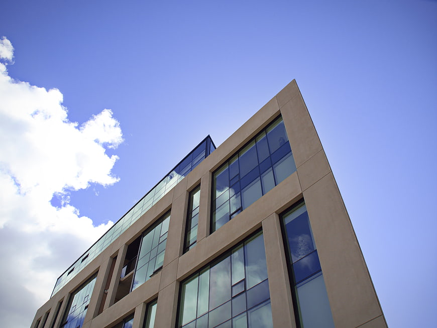 Modern Office Building Exterior with Blue Sky