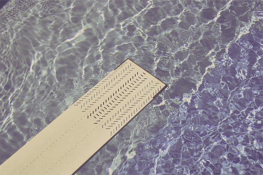 Top View of Diving Board in Swimming Pool Water