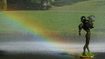 Bronze Leda and the Swan Statue with Rainbow in Park