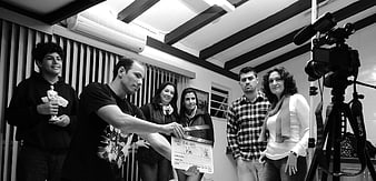 Film crew clapperboard behind the scenes black and white