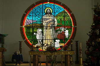 Stained Glass Window of Jesus as Good Shepherd in Church