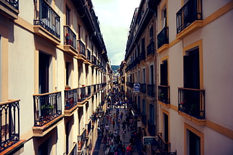 High Angle View of Crowded European Street with Balconies
